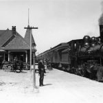The railroad responsible for opening Charlevoix to the world was the Chicago & West Michigan Railway. The C. & W. M. was absorbed by the Pere Marquette Railroad in 1899. The Pere Marquette began a summertime “Resort Special” out of Chicago and Detroit in June of 1904. In 1911, it was reported that the Resort Special that arrived one day was so long—thirteen passenger cars plus baggage cars, coal car, and caboose—the engine had to pull up well past the depot so the front half could unload, then chugged ahead to pull the rear half up to the lengthy platform. Chicago & West Michigan Railway