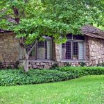 The official “Mushroom House” at the corner of Grant Street and Clinton Street is considered to be Earl Young’s residential masterpiece. (Photo courtesy of Mike Barton) "Mushroom House" - Earl Young Mushroom House Tours