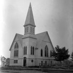 The Baptists laid the cornerstone of their church in 1888 a block south of the Methodists where the fire department, a wing of City Hall, is now. Charlevoix Resort Association members (the Belvedere Club), mainly Baptists from Kalamazoo, helped amass the $600 needed to purchase the property. The church was dedicated in August of 1889. It was razed in February, 1988. The church rebuilt on M-66 south of town, taking the original bell with them. Two summer worshippers during the earlier years of the 20th century were American poet Sara Teasdale and automobile pioneer Ransom E. Olds. Baptist Church