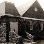Begun as a campground in 1892 on the South Arm of Pine Lake, the Church of God moved to Charlevoix in 1906. It received a land donation on West Hurlbut Street in 1917 where this church went up, a sturdy compact structure faced with area fieldstone transported into town by teams of horses. The men in the congregation did the stonework, producing a house of worship unique in appearance until it was renovated in 1975 Church of God