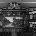 On the west side of Bridge Street, the 800-seat Lewis Grand Opera House, built in 1881, occupied a prominent location next to the bridge. The opera house was the creation of Dr. Levi Lewis, the town’s first physician, at the insistence of his culturally-minded and strong-willed wife Edith. She felt that Pine River, so isolated when they arrived in 1869, was at best a cultural backwater. With the main floor chairs removed, the auditorium turned into a dance hall or a basketball court. High school graduation ceremonies were often held here. Lewis Grand Opera House