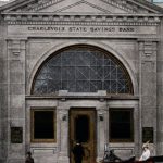 The Charlevoix State Savings Bank, built in 1912, the only neo-Roman commercial building erected in town. During the Depression the bank was about to go under when summer resident Ransom E. Olds, founder of Oldsmobile, asked how much it would take to keep it solvent. He wrote out a check for the amount and the bank survived. The building has housed a variety of businesses since the bank moved and rebuilt on State Street. Charlevoix State Savings Bank