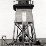 The South Pier was repaired in 1940, but this photo was taken about ten years before that. Photograph is property of the Charlevoix Historical Society.