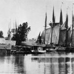 Schooners often came into Round Lake not on business but to seek refuge from the sudden squalls that could roar out of nowhere on the big lake. They raced for shelter, tied up wherever they could find space, often next to a sister ship, and spent a day or two drying their sails before they ventured forth to continue their journeys. This was a common sight on Round Lake for decades. Round Lake